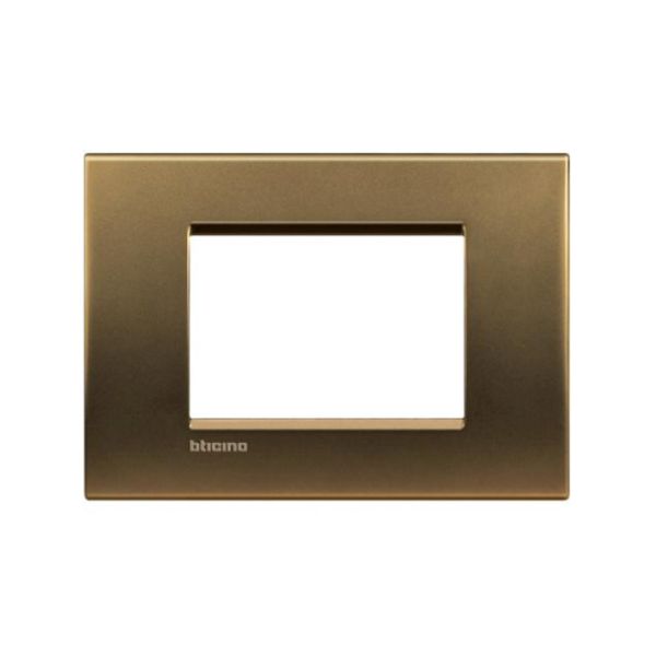 Placa rectangular de 3 módulos, bronce. LNA4803BZ Bticino